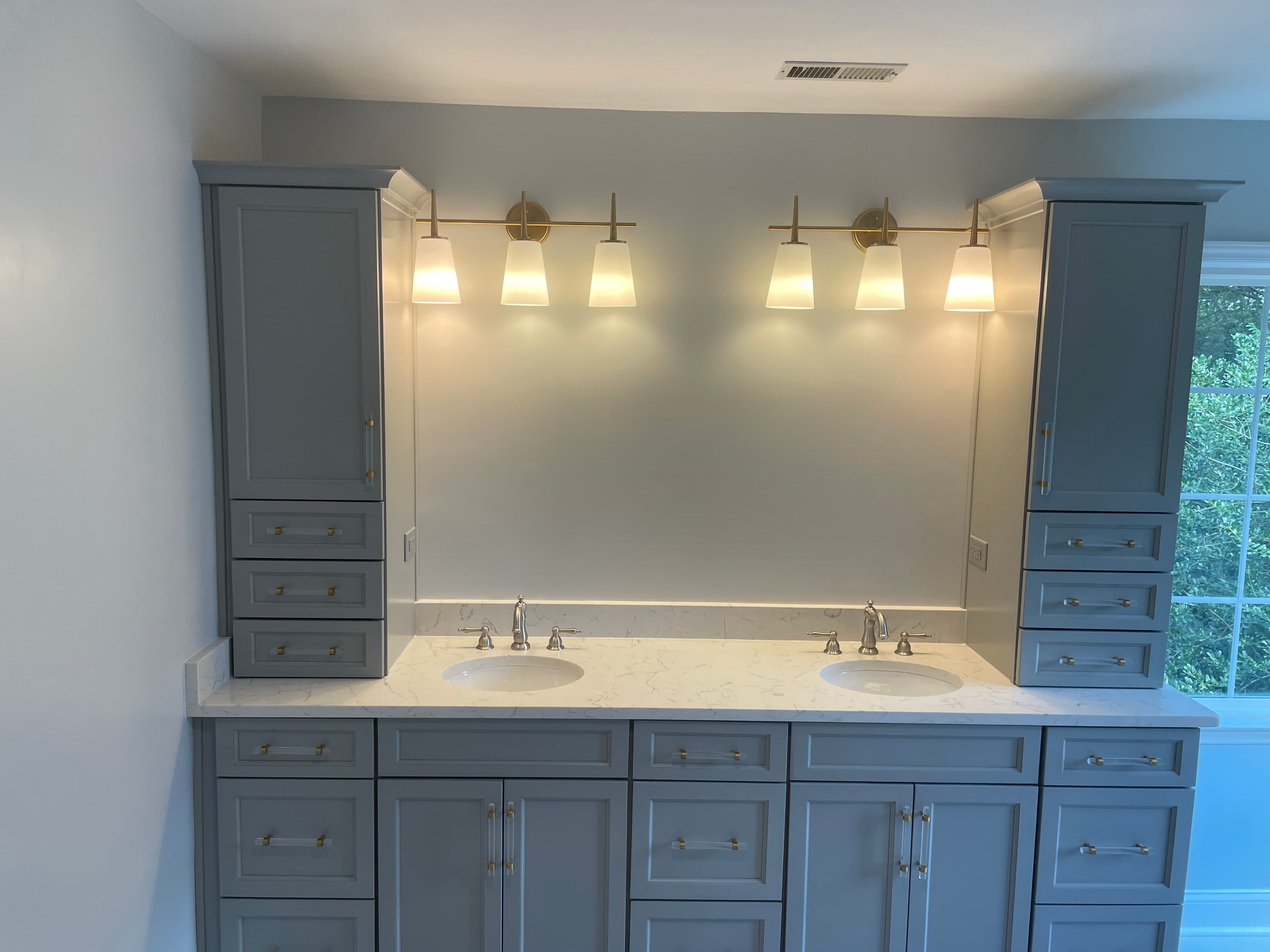 Completed bathroom renovation with modern design elements
