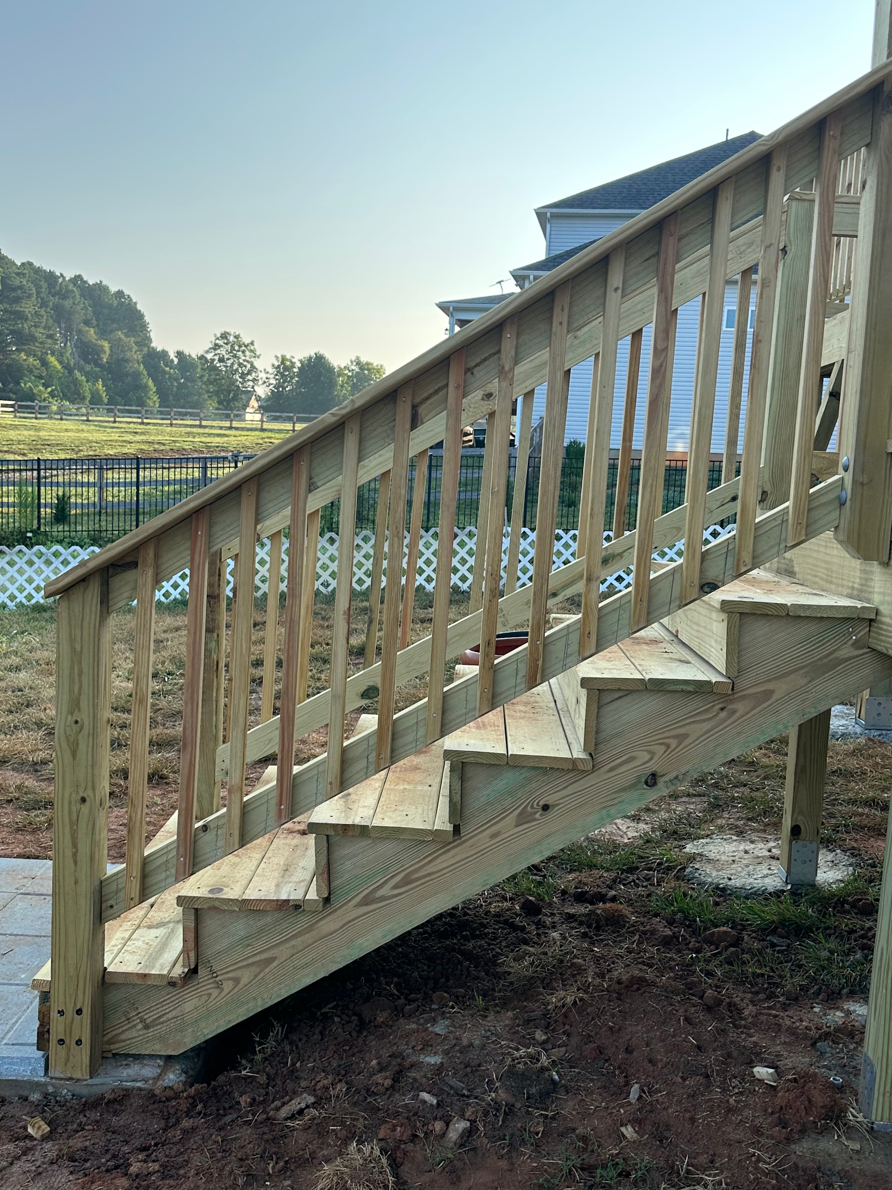 Deck construction project C featuring new outdoor deck installation