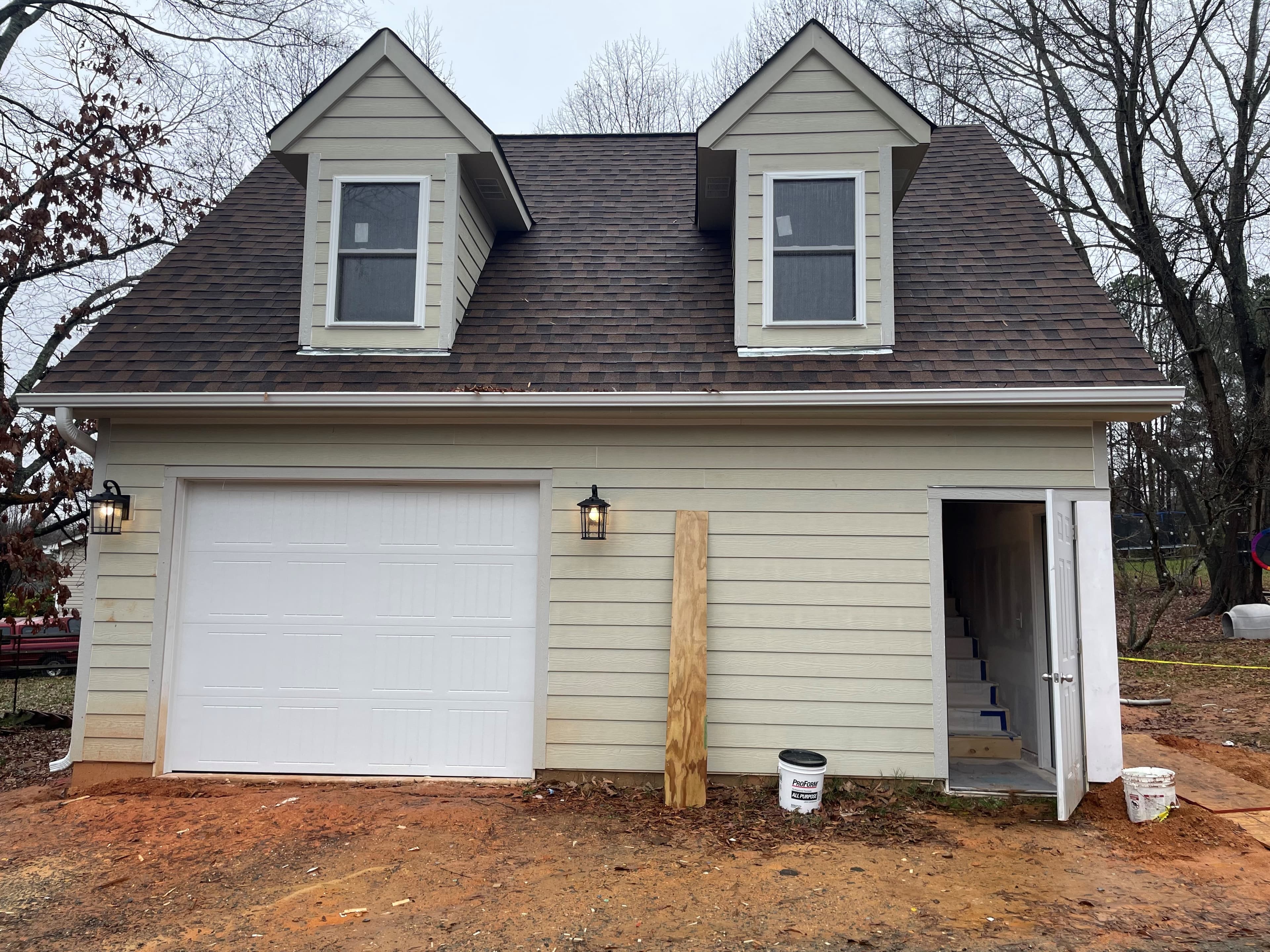Garage renovation project B showcasing improved organization and storage solutions